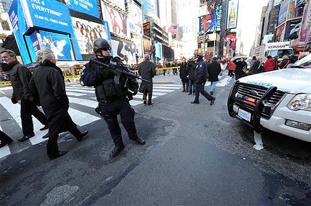 A heavily armed police officer in Times Square